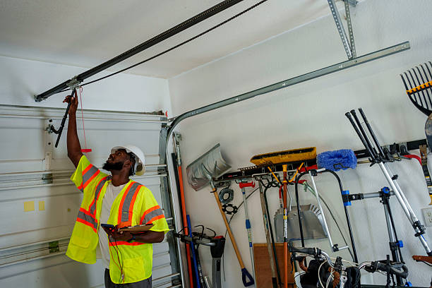 Professional Garage Door Panel Replacement technician working in Chandler, IN